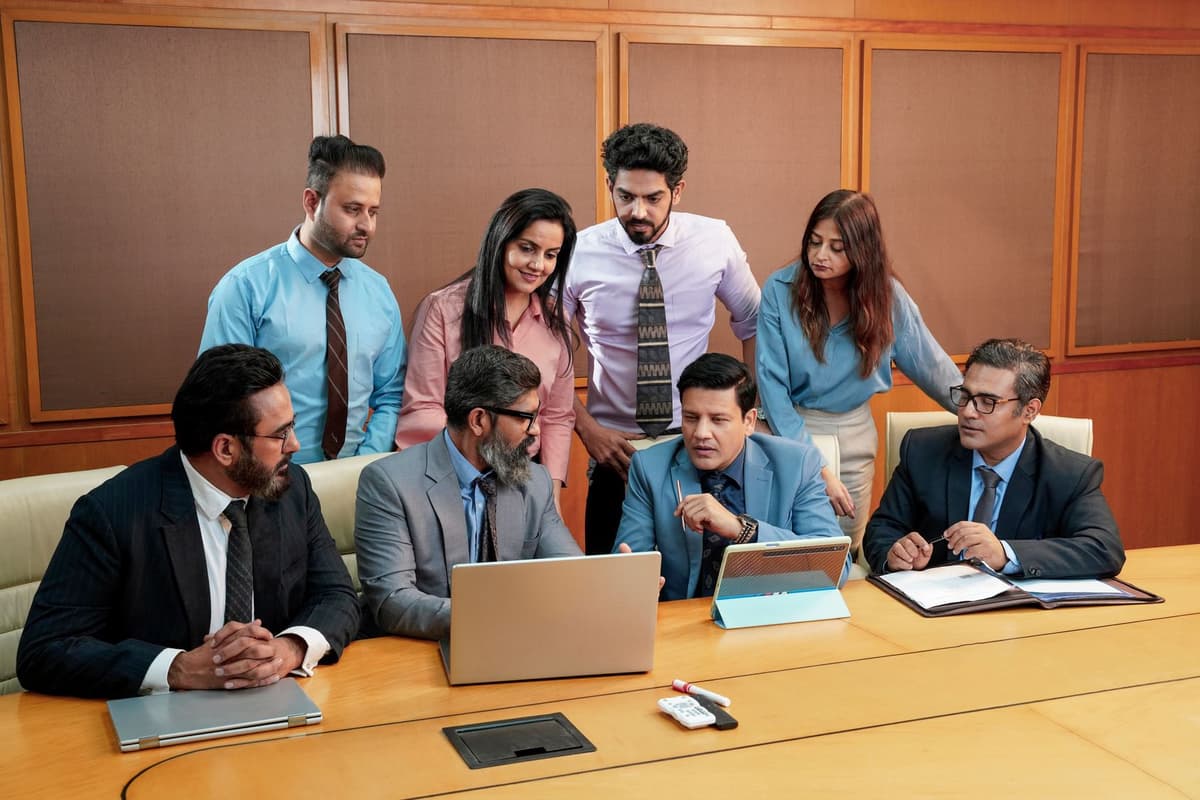 Leaders around a boardroom table