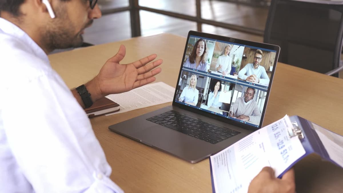 A leader on a video call with a distributed team