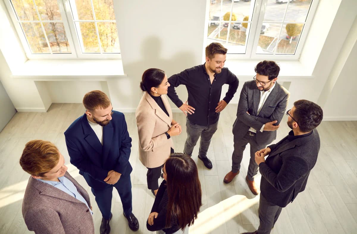Professionals meeting and talking at a business event
