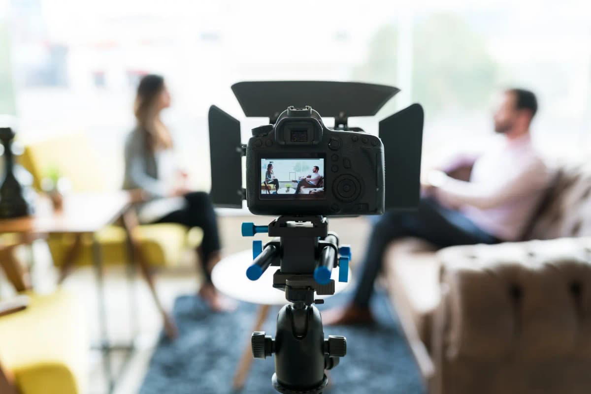 A business leader being interviewed on camera